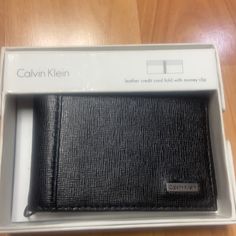 Calvin Klein Credit Card With Money Clip Wallet. Smoke And Pet Free Home Black Wallet With Id Window For Gift, Black Wallet With Id Window As Gift, Elegant Black Rectangular Trifold Wallet, Calvin Klein Wallet For Men, Black Wallets With Key Clip For Daily Use, Calvin Klein Wallet, Luxury Black Trifold Wallet With Coin Pocket, Blue Necktie, High-end Black Rectangular Wallet