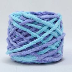 a ball of blue and purple yarn