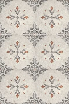 an ornate tile design with orange and gray accents