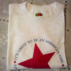 Vintage American Girl T-Shirt, It's Great To Be An American Girl, 2003, (10-12) Nip Red Baby Tee, Radio Dolls Shirt, Radio Dolls Usa Shirt, White Americana T-shirt With American Flag, Turquoise Shorts, Red Short Sleeve T-shirt With American Flag, Light Blue Shorts, White Tee Shirts, Free Tshirt