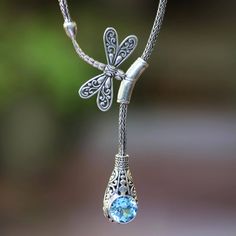 Crafted from sterling silver intricate designs frame a glittering gemstone of faceted blue topaz. Balinese artisan Suar Dwipayana designs this pendant necklace featuring a sterling dragonfly slider that gives it an adjustable length. Blue Topaz Pendant Necklace, Summer Rings, Blue Dragonfly, Dragonfly Jewelry, Dragonfly Necklace, Blue Topaz Pendant, Topaz Pendant, Topaz Color, Dragonfly Pendant