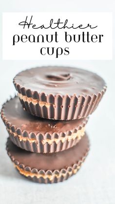 three chocolate peanut butter cups stacked on top of each other with the words healthier peanut butter cups above them