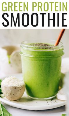 green protein smoothie in a mason jar on a white plate with text overlay