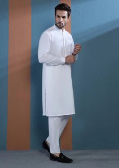 1 Piece - Kurta (Shirt ONLY) : Grace your wardrobe with this quintessential white kurta for men featuring a straight hem and embroidery on the front placket and sleeves. Details : Embroidered Front, Plain Back, Full Sleeves With Cuff, Band Neck Color: White Fabric : Basic Cotton Country of Origin : Pakistan Care Instruction : Should be washed in gentle cycle and hung to dry. Color may bleed so please be mindful of other items with it. Disclaimer : Actual sizes might be slightly different from th Kurta Shirt, Sleeves Details, Kurta For Men, Men's Kurta, White Kurta, Kurta Pajama, Full Sleeves, White Fabric, White Fabrics