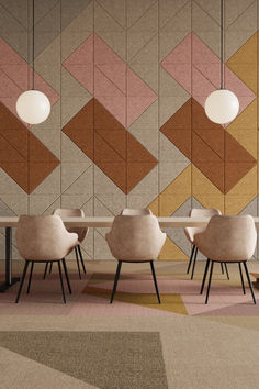 a dining room with chairs and tables in front of a geometric wallpapered background