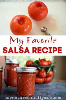 three jars filled with salsa sitting on top of a counter next to tomatoes and peppers