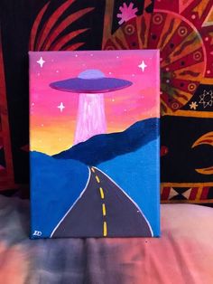 a painting of an alien spaceship flying over a road in the sky with mountains and stars