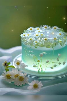 there is a cake with daisies on the table