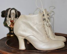 Leather High Heel Boots For Wedding, Wedding Leather Boots With Almond Toe, Leather High Heel Wedding Boots, Leather Almond Toe Wedding Boots, Cream Round Toe Fitted Wedding Shoes, Cream Closed Toe Formal Boots, Cream Fitted Wedding Shoes With Round Toe, Formal Cream Closed Toe Boots, Fitted Cream Wedding Shoes With Round Toe