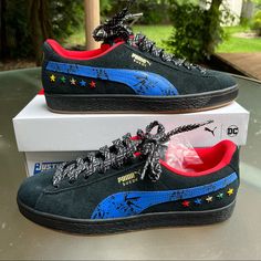 New With Box Puma Suede Justice League Sneakers, Model #385824-01, Size 9.5 D/M. Suede Leather Upper. Color Is Black With The Blue Stripe. Stars In The Back Representing The Members Of The Justice League. Sizing Advice: This Fits If You Are A 9d On The Brannock Shoe Measuring Device. 6-1022box32 Black Puma Sneakers With Round Toe, Black Slip-on Puma Sneakers, Black Leather Puma Sneakers, Puma Slip-on Sneakers For Streetwear, Puma Logo Slip-on Sneakers For Streetwear, Puma Shoes, Puma Ralph Sampson, Puma High Tops, Puma Sneakers Men