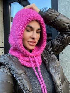 This pink knit warm stylish hood will replace a whole set of accessories for you: a hat, a snood, a scarf, a neck warmer ... that is all in one. It will definitely not ruin your hairstyle and is very comfortable. In a car or a store, you just take it off your head and wear it like a simple hood. Easy to wear, protects your neck and head against cold. Elegant and sportive, great for daily comfort. One size fits most The composition of materials: 65% alpaca, 28% polyamide, 7% wool + alpaca and sil Knit Balaclava For Winter, Knit Balaclava For Winter Cold Weather, Knit Balaclava For Cold Weather, Winter Knit Balaclava For Cold Weather, Knit Balaclava For Cold Weather And Winter, Winter Hooded Balaclava, Hooded Winter Balaclava, Knitted Balaclava For Winter, Knitted Balaclava For Winter Cold Weather