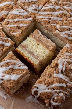 a cake with white frosting and slices cut out