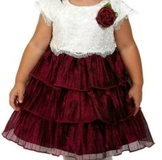 Jona Michelle Baby/Toddler Girl's Ivory Popover & Tiered Metallic Fanciful Dress-Size-24M/2T.  Polyester, Nylon & Metallic.  Elegant dress has an embroidered floral ivory mesh popover with scalloped fringed edges on upper bodice.  Round neckline is accented with a burgundy metallic flower with light green velvet leaves sitting on left side.  Simple button back for easy over-the-head dressing.  Sleeveless.  A burgundy satin sash ties into a decorative bow at back of waistline which also adjusts fit.  Stunning shimmering pleated burgundy taffeta tiers down from waistline into a fashionable float/swing skirt.  Dress is lined and has a ruffled tulle underlay with finished edges creating a fuller skirt.  Dress measures approximately 21 inches from top of shoulder to bottom edge of tiered metall Velvet Leaves, Girls Formal Dresses, Satin Sash, Glamorous Dresses, Formal Dresses Short, Formal Party, Girl Falling, Baby & Toddler Clothing, Skirt Dress