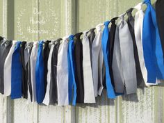 ribbons are hanging on the side of a building