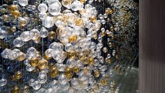 an art piece made out of glass balls