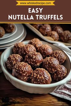 chocolate covered nutella truffles in a white bowl on a table with plates