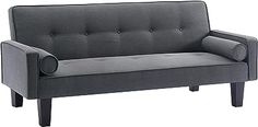 a gray couch sitting on top of a wooden floor