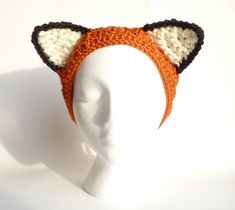 "This pattern will teach you how to make an adorable fox headband ear warmer. Size: the band is approximately 17\" long (with some stretch) and 2.75\" wide with 9\" long braided tails on each end (the braids make the headband adjustable so that it can fit children, teens and adults!) You may sell items made from this pattern. You can always contact me if you have any problems with the pattern. I'm happy to help if you have any questions along the way. Thank you, Jennifer Feel free to look around! zxcvvcxz.etsy.com" Fox Hat Pattern, Fox Hat Crochet, Crochet Braid Pattern, Fox Headband, Easy Crochet Headbands, Bandeau Au Crochet, Crochet Headband Pattern Free, Fox Costume, Headband Crochet