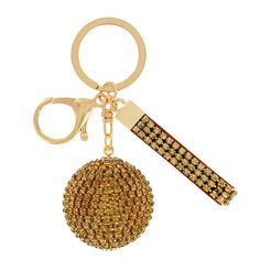 a gold colored keychain with a brown and white beaded ball on it