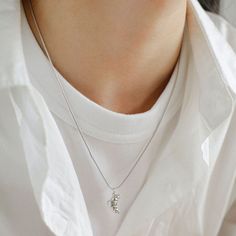 The croissant pendant is petite in size and exudes understated elegance, making it perfect for everyday wear. Whether worn alone as a sophisticated statement piece or layered with other necklaces for a more eclectic look, this necklace adds a unique and playful element to your style. Metal: 18K Recycled Gold Plated Vermeil on Recycled Sterling Silver/Recycled Sterling Silver Necklace length 410-465mm (pendant length 17mm) Weight: 6g Edison Pearls, Tiger Eye Stone, Understated Elegance, Recycled Gold, Recycled Sterling Silver, Necklace Length, Sterling Silver Necklace, Croissant, Stone Necklace