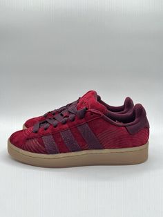 Elevate your sneaker game with these Adidas Men's Campus 00s Lifestyle sneakers. The maroon and purple colorway, combined with the brand's signature three stripes, creates a stylish and athletic look perfect for any occasion. The size 7 (UK) and 7.5 (US) shoes are designed for men and feature a comfortable and supportive fit. These sneakers are part of the Adidas Lifestyle product line and are the perfect addition to any sneaker collection. The athletic style and sneaker design make them ideal for both casual and active wear. Don't miss out on the opportunity to own these stylish and versatile sneakers. Versatile Sneakers, Maroon Purple, Sneaker Design, Lifestyle Sneakers, Athletic Looks, Athletic Style, Sneaker Games, Athletic Fashion, Sneaker Collection