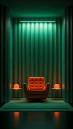 an orange chair sitting on top of a rug in front of a green curtained wall