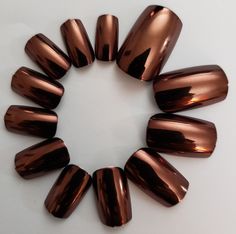 Metallic Brown Color Metal Plating Acrylic Medium Round Reflective Mirror Nail Tips (24 Count). Glue/Adhesive Sold Separately. ~Full Coverage ~Press Ons Copper Metallic Nail Polish, Brown Metalic Nails, Rust Chrome Nails, Metallic Brown Nails, Bronze Nails Acrylic, Caramel Brown Nails, Brown Metallic Nails, Copper Chrome Nails, Copper Nails Designs