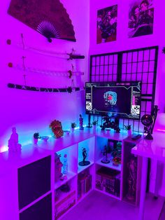 the room is lit up with purple lighting and various items on shelves in front of it