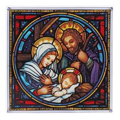 a stained glass window depicting the birth of jesus