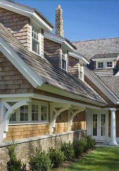 the house is made of wood and has white trim