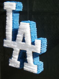 the los angeles dodgers logo is made out of toothpaste and plastic straws