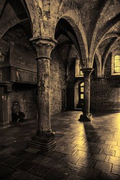 an old stone building with columns and arches stock photo