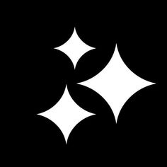 three black and white circles on a black background