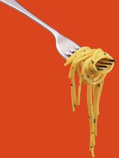 a fork with some noodles on it