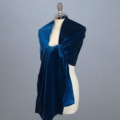 A very elegant velvet shawl for your wedding party or evening dress. Made of luxury bridal velvet.  Color: teal blue (other colors are available) Size: 190 cm x 48 cm approx.  The shawl comes one sided , but due to heavy fabric is warm and luxurious. You can use it as a wrap, shawl or stola. WE have matching bags in our Etsy Shop! WE accept credit cards! Warning: Although the fabric we use is of high quality, in certain cases during high humidity of air / humid skin etc. dark navy blue and black Elegant Blue Shawl For Evening, Elegant Blue Shawl For Parties, Velvet Shrug, Velvet Shawls, Bridesmaid Scarves, Navy Shawl, Wedding Shrug, Blue Shawl, Velvet Shawl