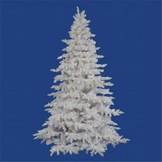 a white christmas tree is shown against a blue background