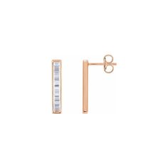 Classic and elegant, these baguette diamond earrings offer a sophisticated and sleek design. Metal: 14K gold Diamond Quality: H color, I1 clarity Diamond Weight: 0.50 carats total Earring Dimensions: 19mm x 3.5mm Ships in: 0-7 Days Rose Gold Baguette Cut Diamond Earrings, Rose Gold Baguette Diamond Earrings For Formal Events, Modern Baguette Earrings For Formal Events, Modern Baguette Earrings For Formal Occasions, Minimalist Baguette Cut Formal Earrings, Minimalist Formal Baguette Cut Earrings, Edelweiss Jewelry, Baguette Diamond Earrings, Titanium Wedding Band