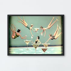 a painting of women in swimsuits and martini glasses floating on the water with their feet up