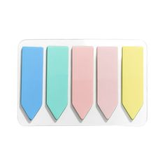 four pastel colored ties are lined up on a white card with the same color