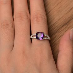 It is a natural amethyst ring. The main stone is 8mm*8mm cushion cut amethyst, weight about 1.92 carats. The basic metal is sterling silver and plated with rhodium. To change the metal to a solid gold (white/rose) or platinum is also available, please ask for a quotation if you want. You can also go to my shop Home for more elegant rings: https://www.etsy.com/shop/godjewelry?ref=hdr_shop_menu Amethyst is the birthstone of January. More amethyst rings: https://www.etsy.com/shop/godjewelry?ref=hdr Amethyst Rings, February Birthstone Ring, Elegant Rings, Ring Purple, Ring Cushion, Cushion Cut Ring, Cushion Ring, February Birthstone, Elegant Ring