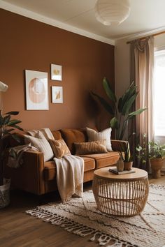 a living room filled with furniture and plants