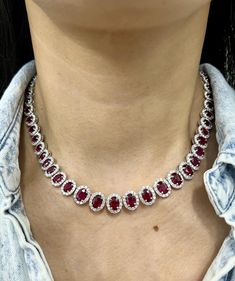 This stunning natural ruby and diamond necklace is sure to turn heads. The necklace features 55 graduated oval rubies and 721 round diamonds encased in platinum. The diamonds boast a color of E/F and VS in clarity. A magnificent necklace to add to any jeweler's collection. Ruby Diamond Necklace, Ruby And Diamond Necklace, Deep Red Color, Wedding Jewellery Necklace, Ruby Diamond, Natural Ruby, Chicago Il, Wedding Necklace, Deep Red