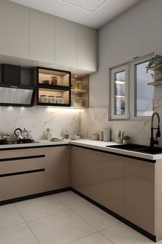 a modern kitchen with marble counter tops and cabinets