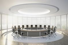 a round conference table in an office setting