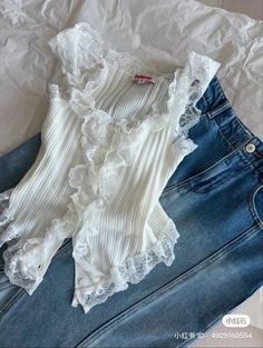 Lace Ruffled Camisole Tank Top, Lace Ruffle Camisole Tank Top, Ruffled Lace Camisole, Lace Tops With Ruffles, Chic Tops With Lace Trim And Ruffled Straps, Lace Ruffled Cami Tank Top, White Stretch Tank Top With Ruffles, Lace Ruffle Cami Tank Top, Sleeveless Lace Tank Top With Ruffles