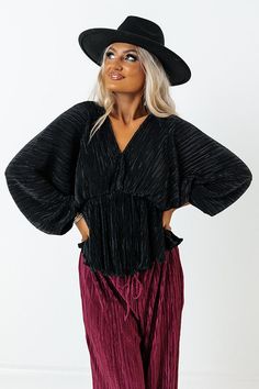 Our must-have 'Cider So Sweet' top is the trendy closet staple that you need this season! Features black colored pleated material, v-neckline with hidden hook and eye for additional closure, keyhole back with button closure, long loose sleeves with elastic banding, elastic below the bustline and a flowy silhouette that falls into a straight hemline. Measurements S : Bust 30", Hip 30", Length 22", Sleeve Length 22", Waist 26-28". M : Bust 32", Hip 32", Length 22.5", Sleeve Length 22", Waist 28-30 Trendy Closet, Sweet Top, Pleated Top, Loose Sleeves, Closet Staples, So Sweet, Need This, Cider, Must Haves