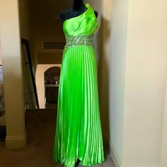 This Elegant Lime Green Formal Pleated Dress Is Adorned Around The Bodice With Sequins. Never Worn In Immaculate Condition Green One-shoulder Maxi Dress For Prom Season, One-shoulder Green Maxi Dress For Prom, Green Pleated Evening Dress For Party, Pleated Green Evening Dress For Party, Green One-shoulder Dress For Prom Season, Green One Shoulder Dress For Prom Season, Green One-shoulder Gown For Cocktail, Green One Shoulder Gown For Cocktail, Green One Shoulder Cocktail Gown