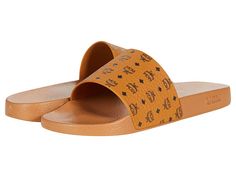 MCM Logo Group Slide - Men's Shoes : Cognac : Complete your beach look with the MCM Logo Group Slide Sandals. Synthetic upper, lining, and insole. Slip-on style. Open toe. Brand signature pattern throughout the upper. Synthetic outsole. Imported. Measurements: Weight: 7 oz Product measurements were taken using size 43 (US Men's 10), width M. Please note that measurements may vary by size. Weight of footwear is based on a single item, not a pair. Reversible Belt, Mcm Logo, Beach Look, Us Man, Slide Sandals, Embossed Leather, Heeled Mules, Cognac, Open Toe