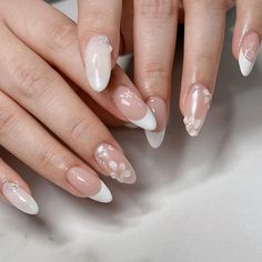 These Elegant 3D Floral White French Nails are perfect for the Bridal Season. The nails feature a delicate blend of white French tips and intricate 3D floral designs, embodying the purity and beauty of a wedding day. 🌸Click on the image to shop our Wedding Gel Nail Polish Collection🌸Credit: janetsnailstudio on Instagram🌸bridal nails, French nails, almond nails, floral nails, white nails almond nails, bridesmaid nails, wedding nails, elegant nails, classy nails, prom nails, Korean nails, 3d na Cute Nails Wedding, Wedding Nail For Bride, 3d Wedding Nails For Bride, Nails For Bridesmaids Wedding, Bride’s Nails, Wedding Nails Inspo For Bride, Wedding Gel Nails For Bride, Almond Nails For Wedding, French Nails Bride