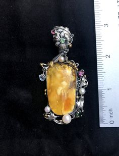 "ARTISAN AMBER GEMSTONE PENDANT Hand-made Sterling Silver 925. 24k Gold Stones used: Butterscotch Baltic Amber Pink&Green Tourmaline, Pearls Height - 2 3/4' (with bail), Width - 1 3/8' Height -70mm (with bail), Width - 35mm Unique Handcrafted One-of a-kind Design Pendant Each Piece of Jewelry in my Collection is Absolutely One of a Kind! When you start wearing a piece of my jewelry you will fall in love with it more and more each day and feel that good Energy and Love that I pass into it whi Luxury Yellow Multi-stone Jewelry, Fine Jewelry Cabochon Gemstone Pendant, Luxury Handmade Gemstones For Formal Occasions, Elegant Yellow Cabochon Necklace, Antique Multi-stone Pendant Jewelry, Elegant Amber Rectangular Pendant Jewelry, Unique Gold-colored Sterling Silver Gemstones, Luxury Citrine Cabochon Jewelry, Unique Yellow Gold Sterling Silver Gemstones